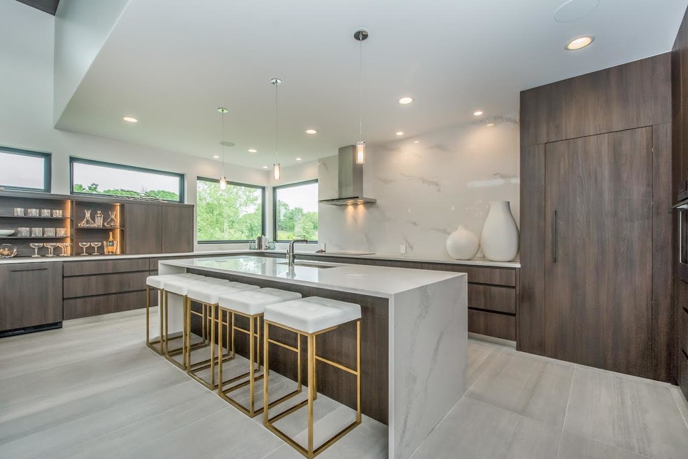 Inspiration for a large modern u-shaped open plan kitchen in Other with an undermount sink, flat-panel cabinets, dark wood cabinets, marble benchtops, white splashback, stone slab splashback, panelled appliances, porcelain floors, with island, grey floor and white benchtop.