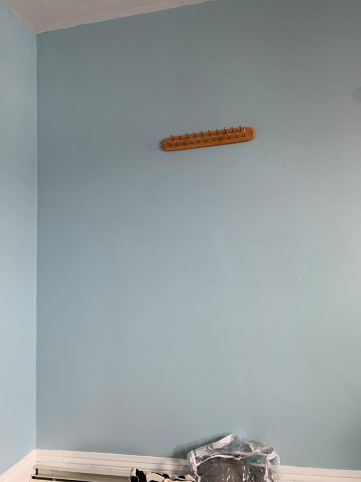 How can you make a baby blue bedroom look less blue?