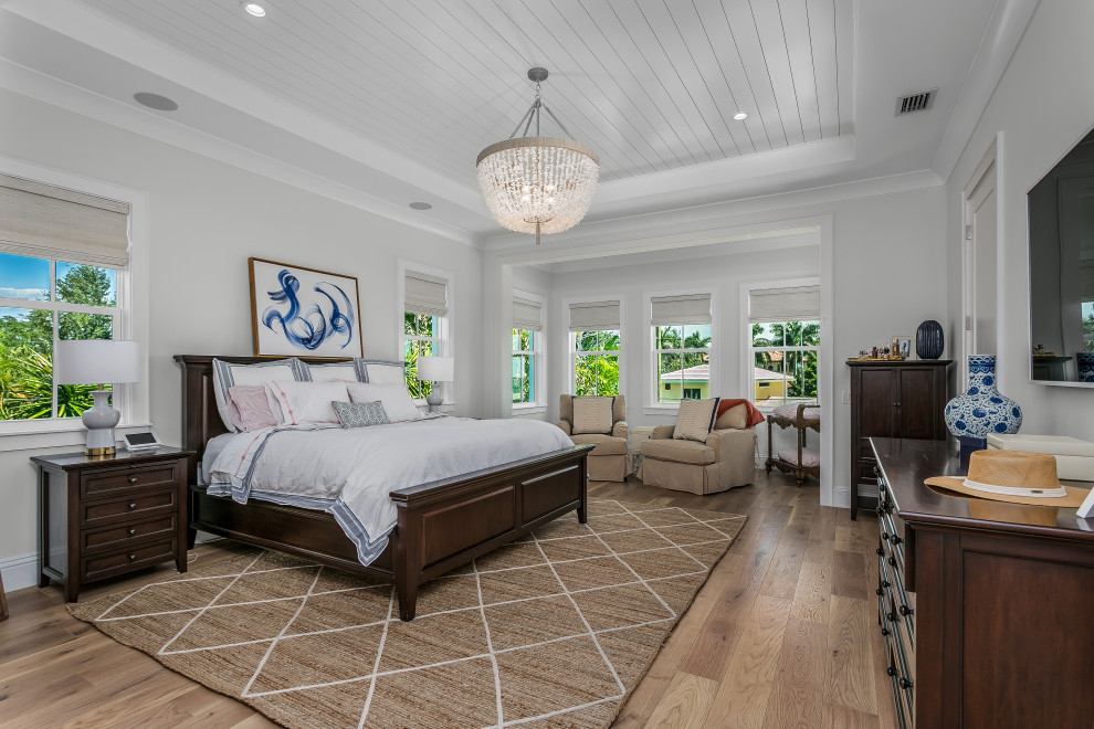 Design ideas for a large coastal bedroom in Tampa.
