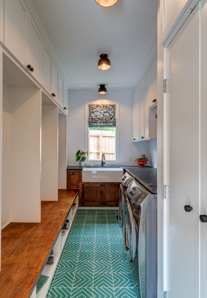 Inspiration for a mid-sized contemporary galley utility room in Nashville with shaker cabinets, white cabinets, soapstone benchtops and black benchtop.
