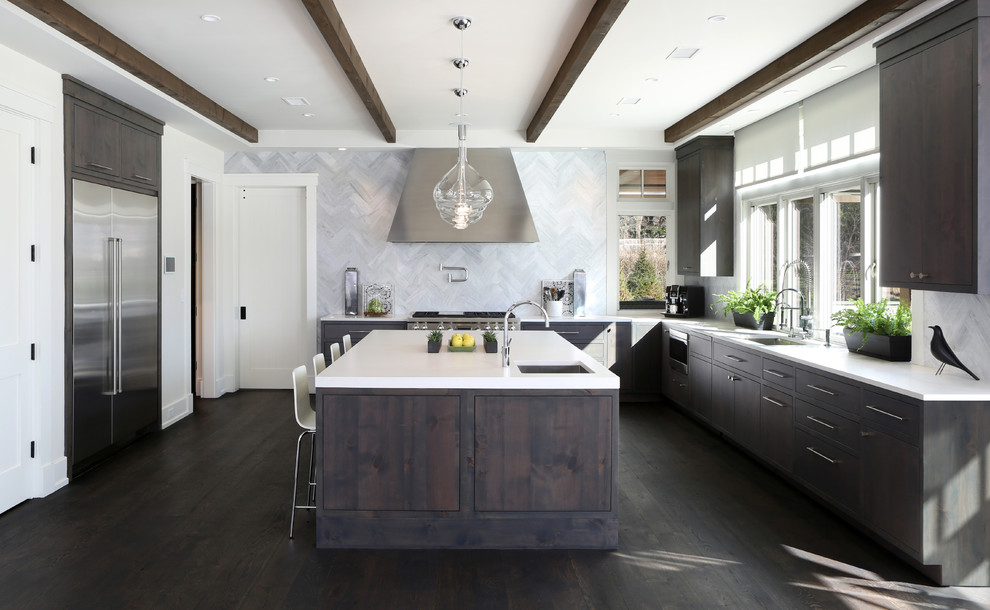 Inspiration for a transitional u-shaped kitchen in Other with an undermount sink, flat-panel cabinets, dark wood cabinets, grey splashback, stainless steel appliances, dark hardwood floors, with island and brown floor.