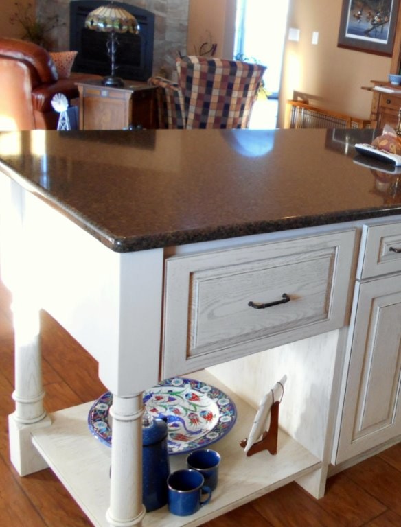 Kitchen - mid-sized transitional medium tone wood floor kitchen idea with raised-panel cabinets, light wood cabinets, quartz countertops and an island