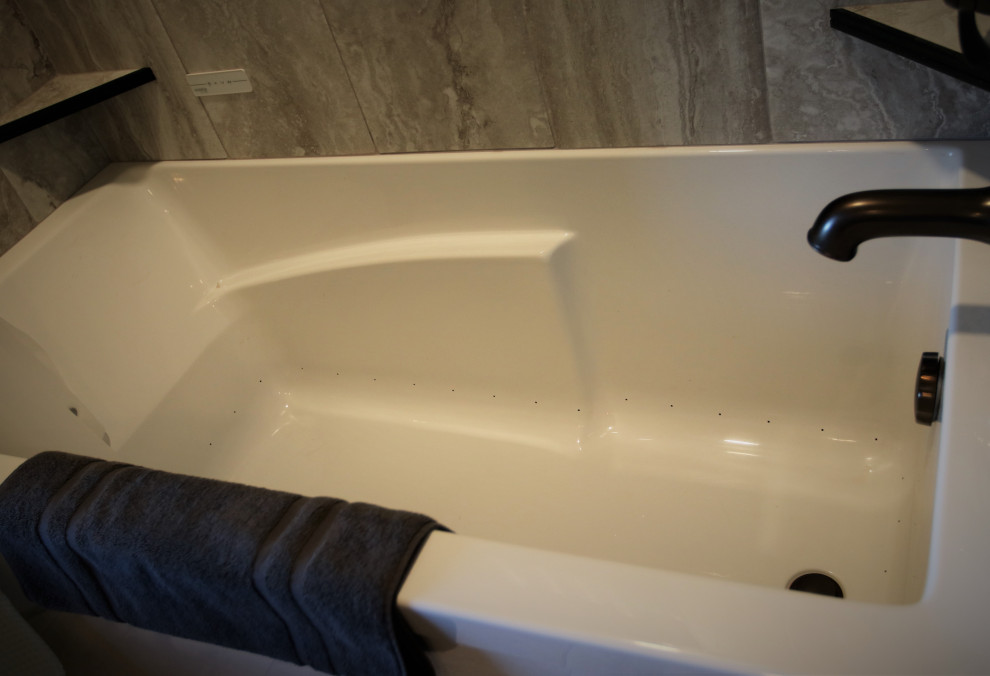 Inspiration for a small rustic alcove bathtub remodel