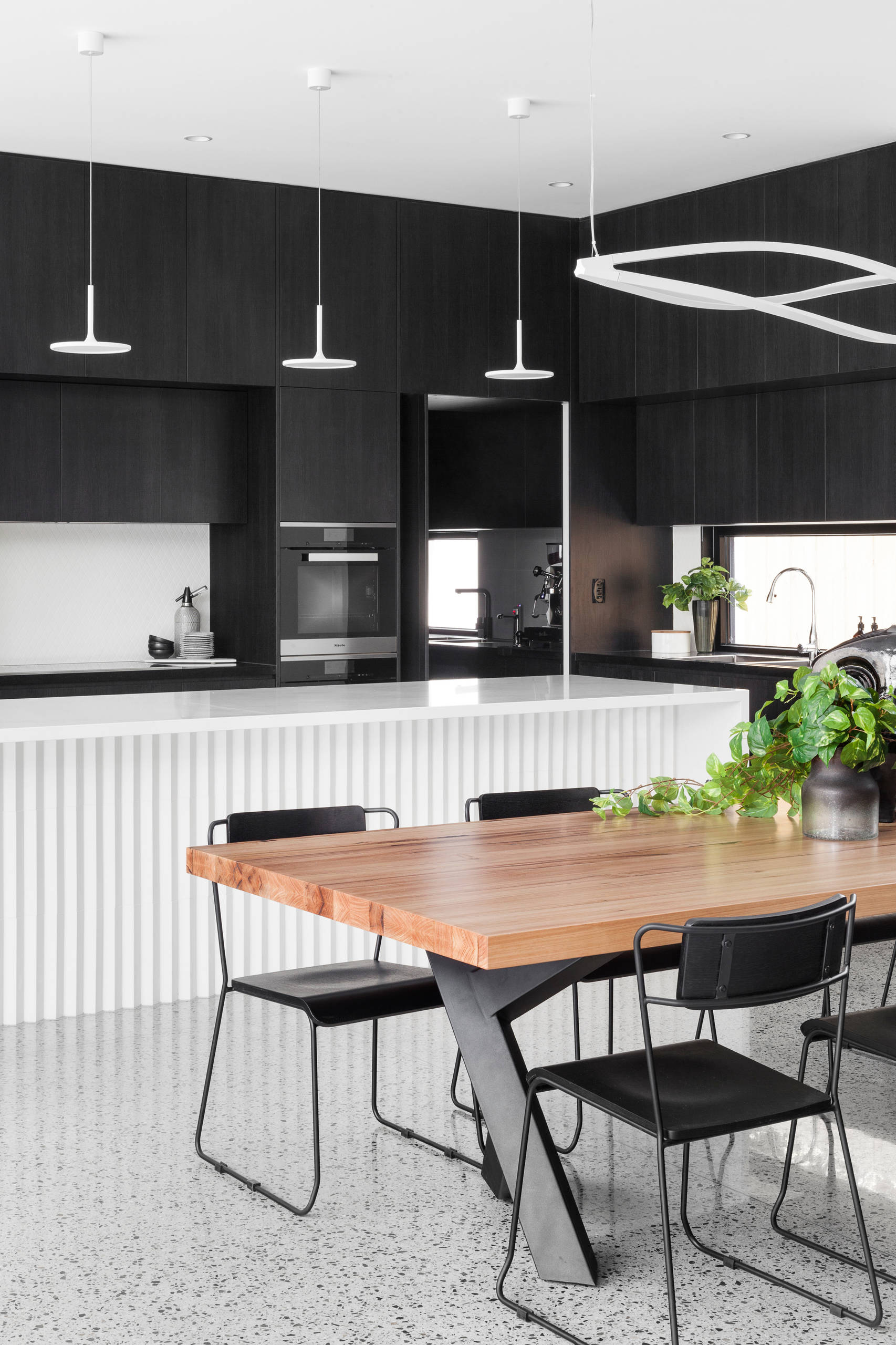 Warthen Team on X: Black kitchens are just as timeless as white ones, they  can be cozier and a little moodier. This stylish space just might inspire  you to go dark. #kitchen #