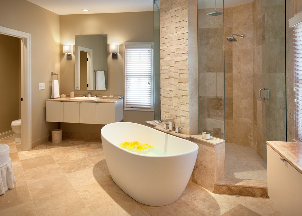 This is an example of a contemporary bathroom in Columbus with a freestanding tub.