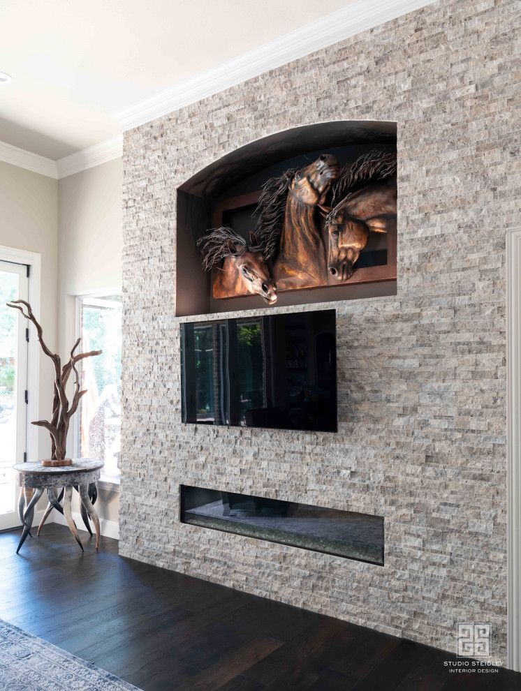Inspiration for a large transitional open concept family room in Dallas with beige walls, dark hardwood floors, a ribbon fireplace, a built-in media wall and brown floor.