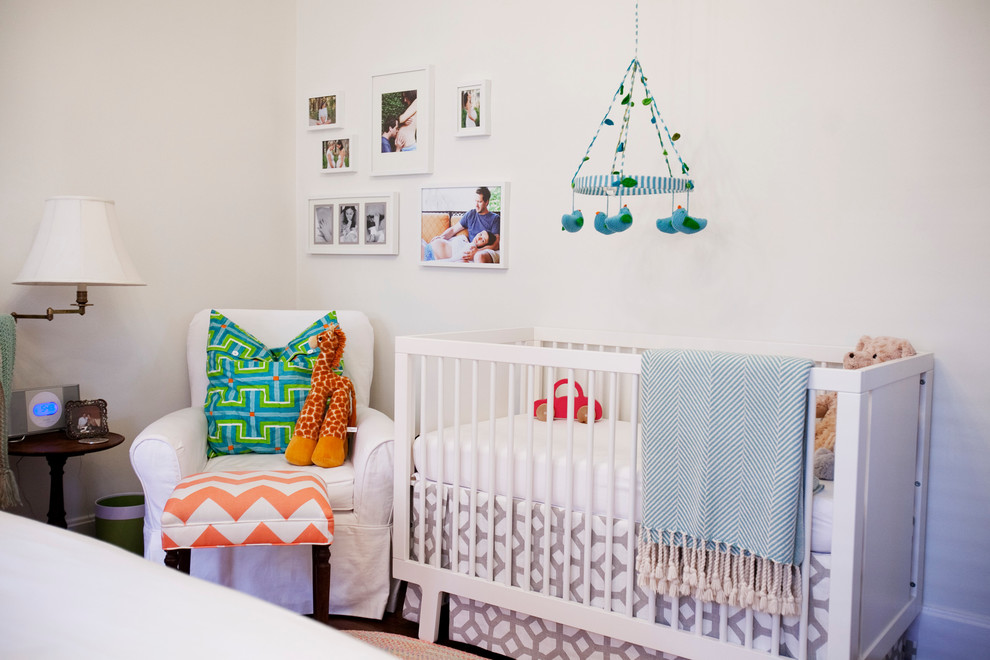 Design ideas for a mid-sized eclectic nursery for girls in Atlanta with white walls.