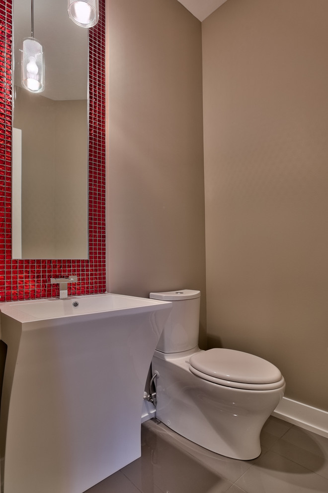 Photo of a contemporary powder room in Omaha.