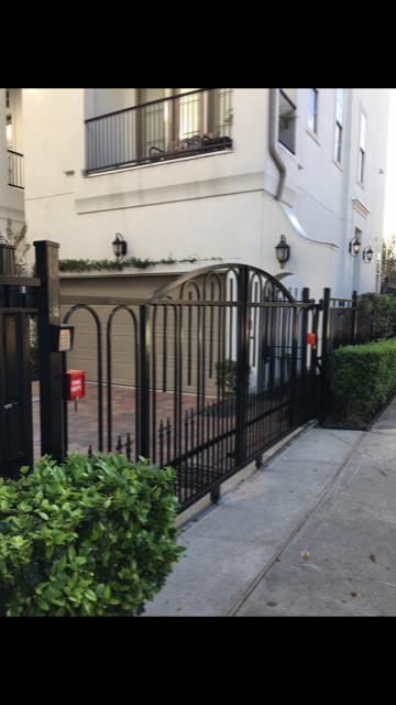 Wrought Iron Fence Renewed & Repainted.