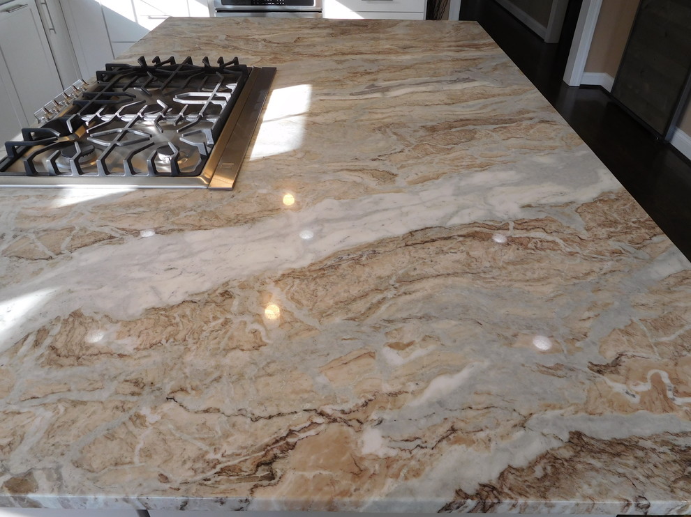 Open concept kitchen - transitional l-shaped dark wood floor open concept kitchen idea in Baltimore with a single-bowl sink, shaker cabinets, white cabinets, quartzite countertops, gray backsplash, glass tile backsplash, stainless steel appliances and an island