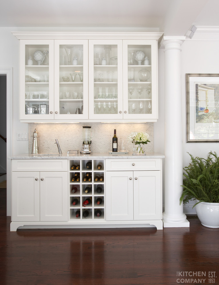 Eat-in kitchen - large transitional single-wall dark wood floor eat-in kitchen idea with shaker cabinets, white cabinets and white backsplash