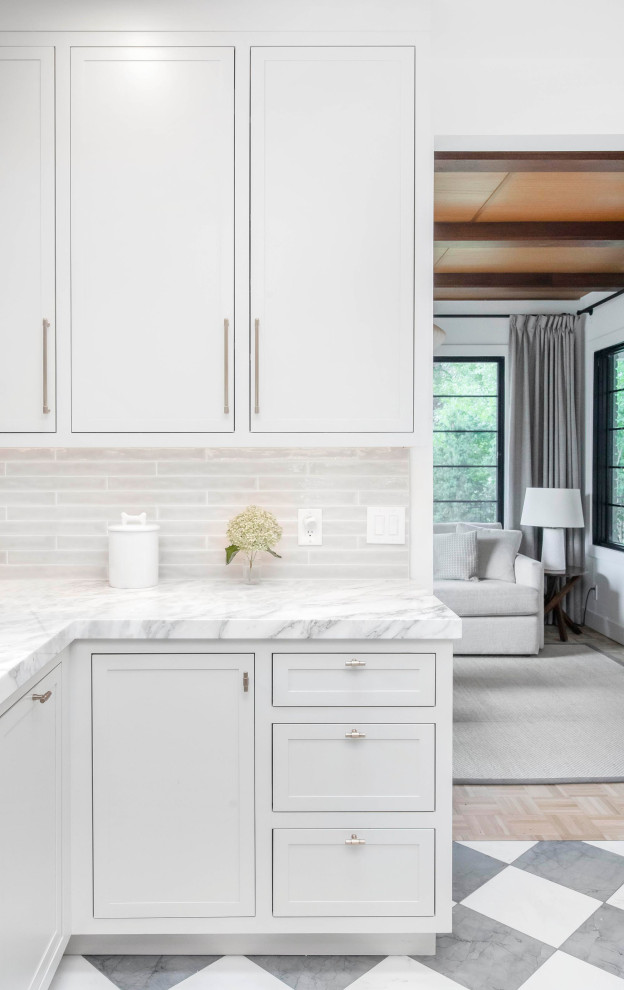 Example of a transitional kitchen design in Denver