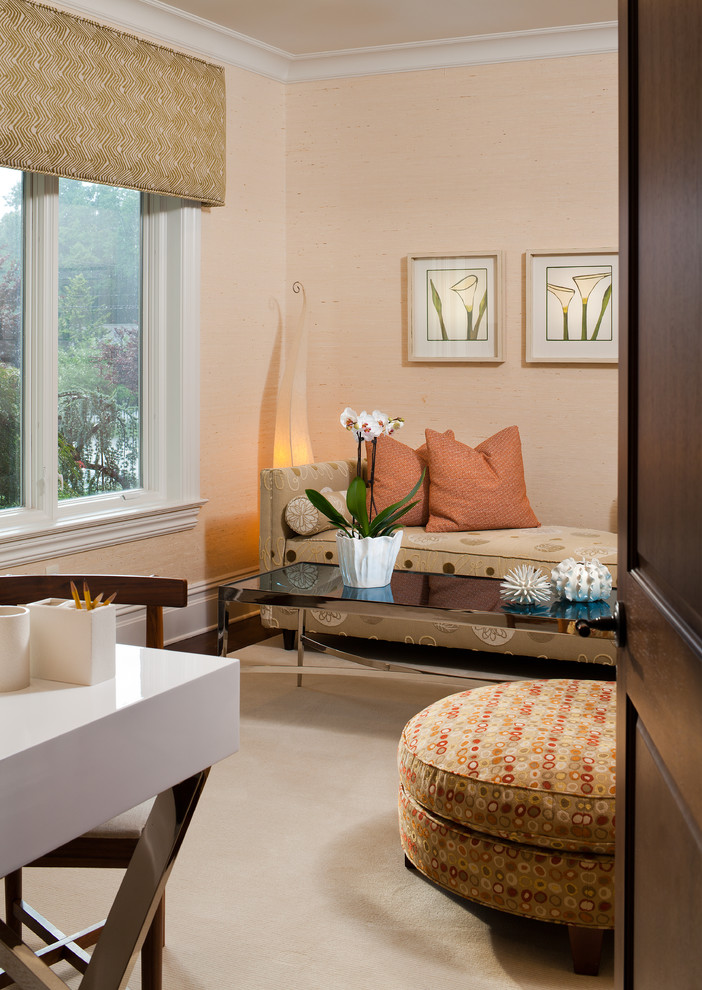 Photo of a small mediterranean study room in New York with carpet, a freestanding desk, yellow floor and beige walls.