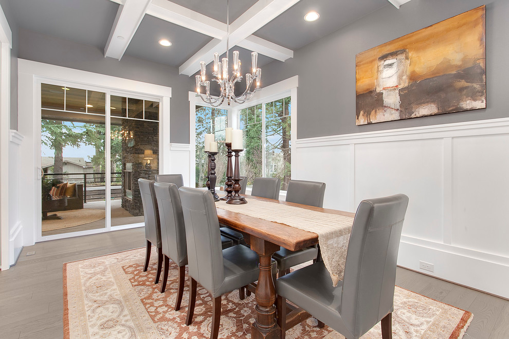Inspiration for a large transitional separate dining room in Seattle with grey walls and medium hardwood floors.