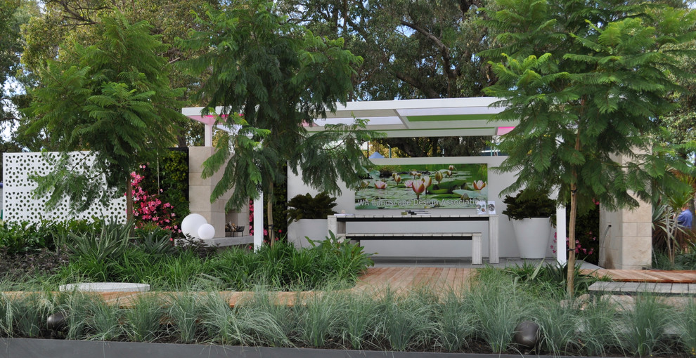 Design ideas for a small contemporary courtyard patio in Perth with a pergola.