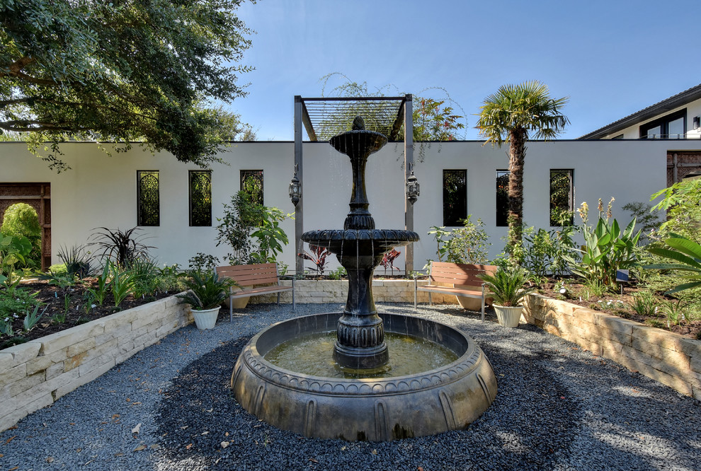 Example of an eclectic home design design in Austin