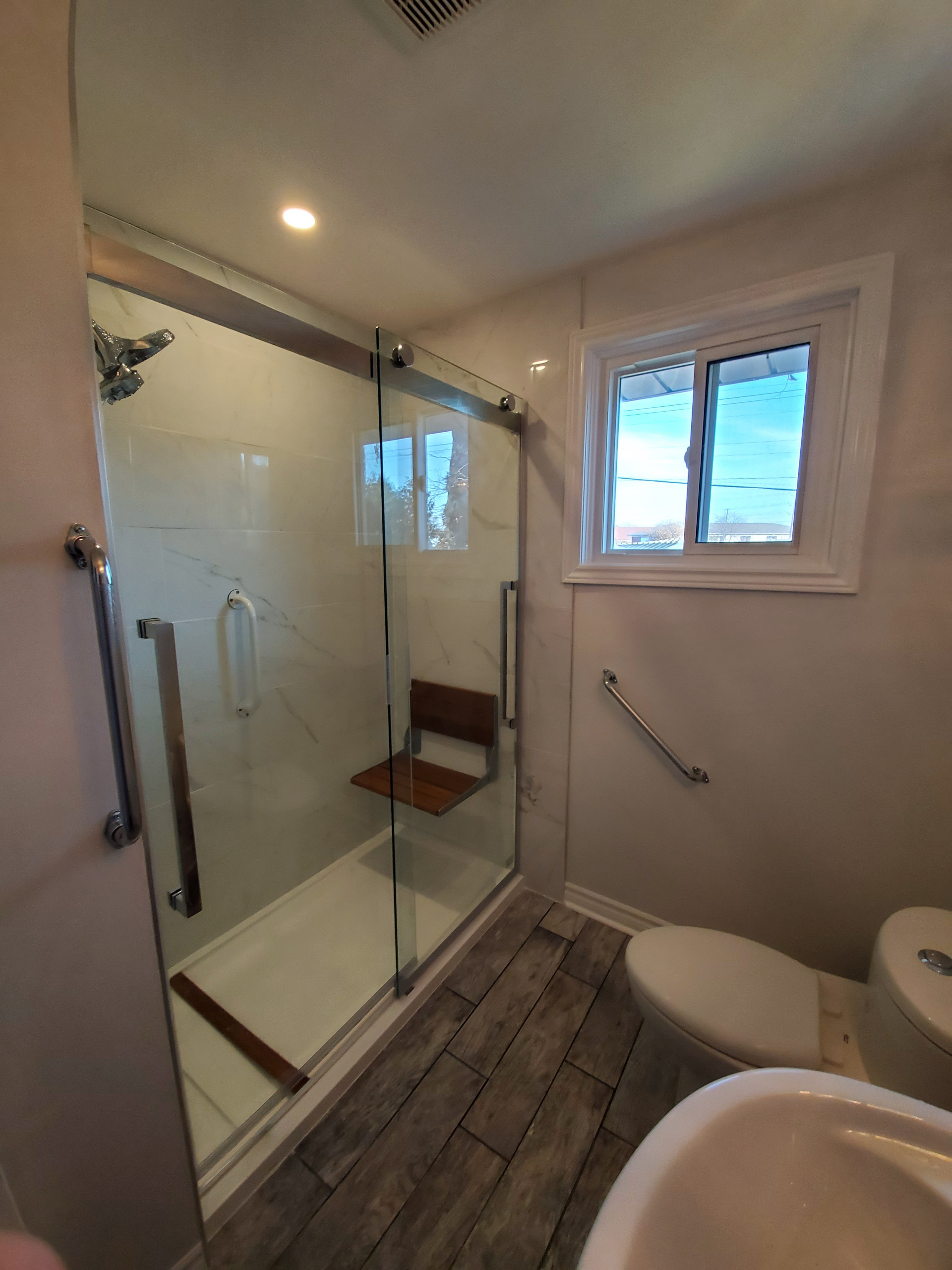 Beautiful Glass Shower with Seating