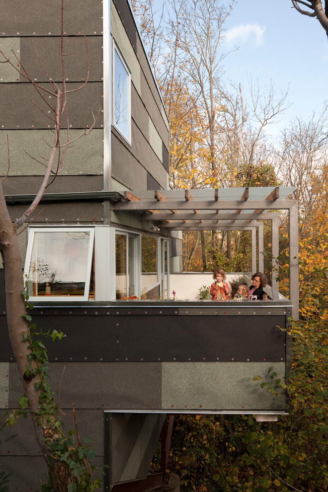 Photo of a contemporary deck in Seattle with a pergola.