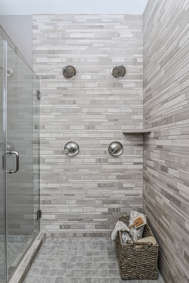 Design ideas for a mid-sized transitional 3/4 bathroom in DC Metro with shaker cabinets, grey cabinets, a freestanding tub, an alcove shower, a two-piece toilet, gray tile, porcelain tile, multi-coloured walls, porcelain floors, an undermount sink and quartzite benchtops.