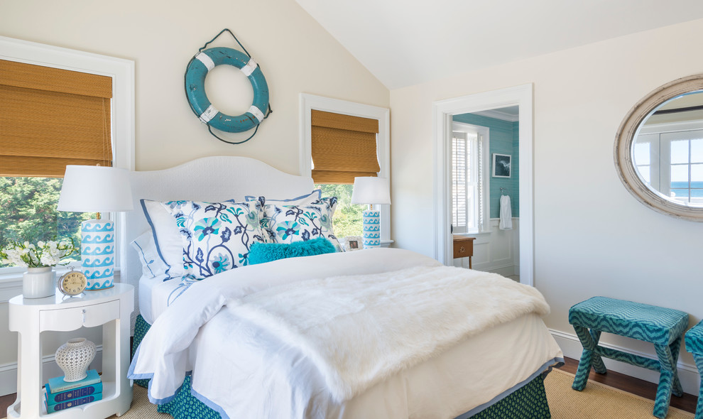 Inspiration for a beach style bedroom in Providence with beige walls and dark hardwood floors.