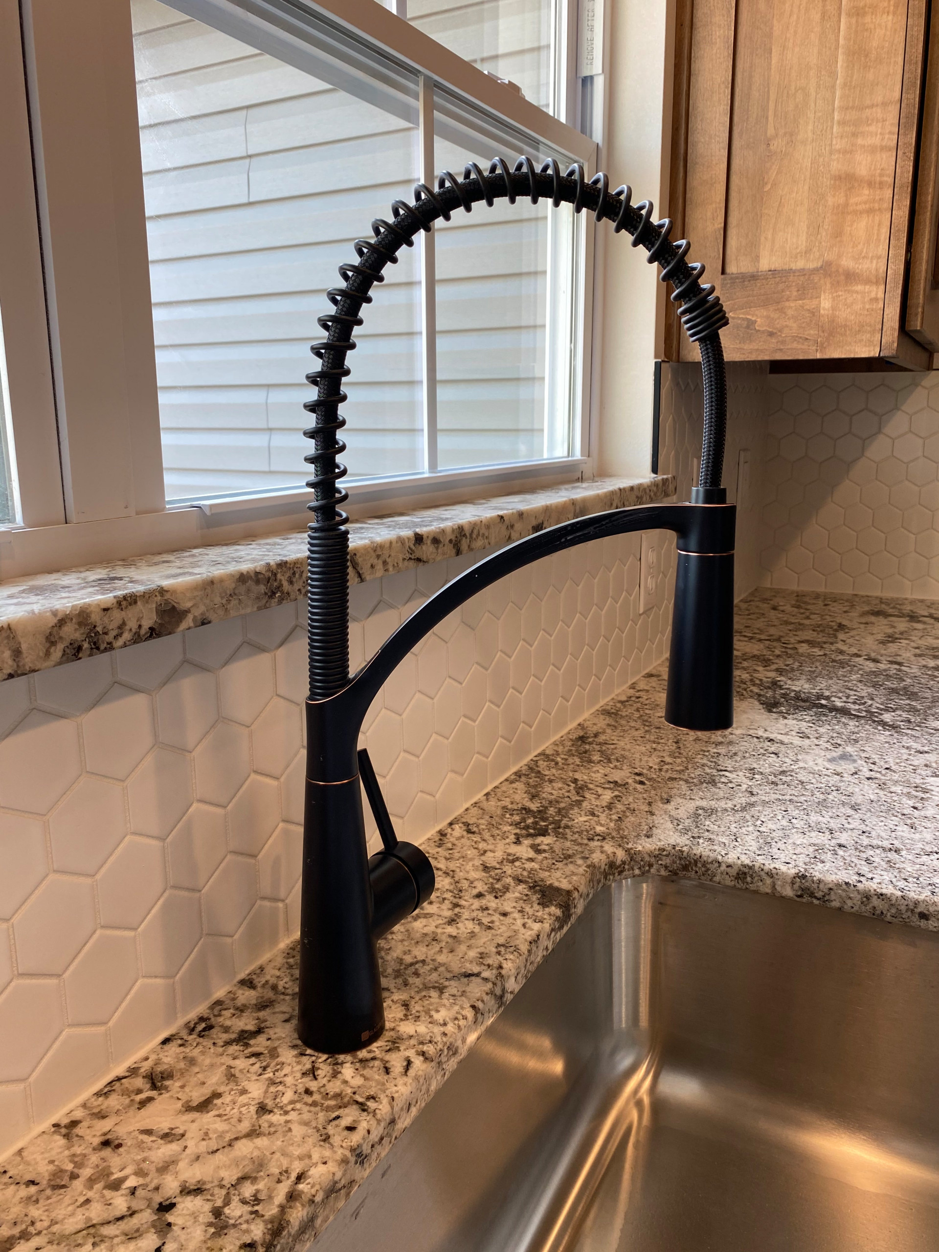 Oil rubbed bronze pull down faucet