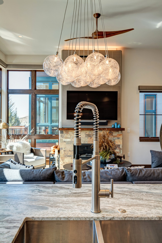 Example of a transitional kitchen design in Denver