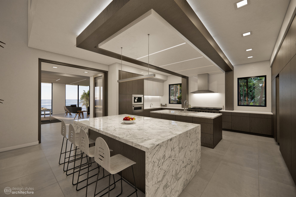 Large contemporary l-shaped open plan kitchen in Tampa with a drop-in sink, flat-panel cabinets, dark wood cabinets, marble benchtops, white splashback, panelled appliances, ceramic floors, multiple islands, grey floor and white benchtop.