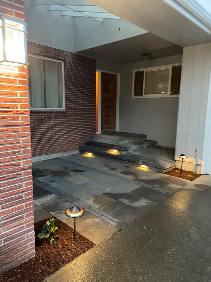 Design ideas for a small contemporary front yard driveway in Seattle with a garden path and concrete pavers.