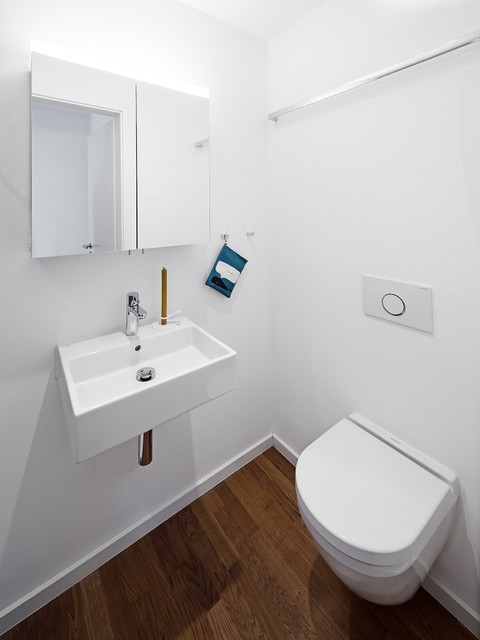 Innenausbau einer Wohnung bei Frankfurt am Main moderno-bagno-di-servizio