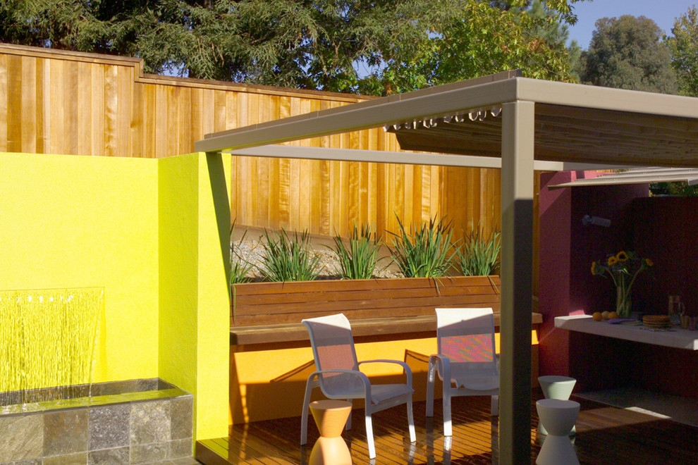 Photo of a contemporary patio in San Francisco with decking and a pergola.