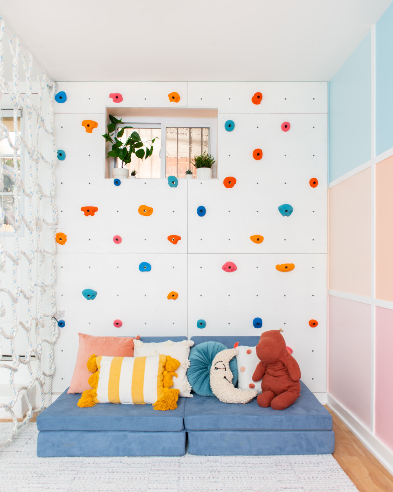 Design ideas for a mid-sized contemporary gender-neutral kids' room for kids 4-10 years old in DC Metro.