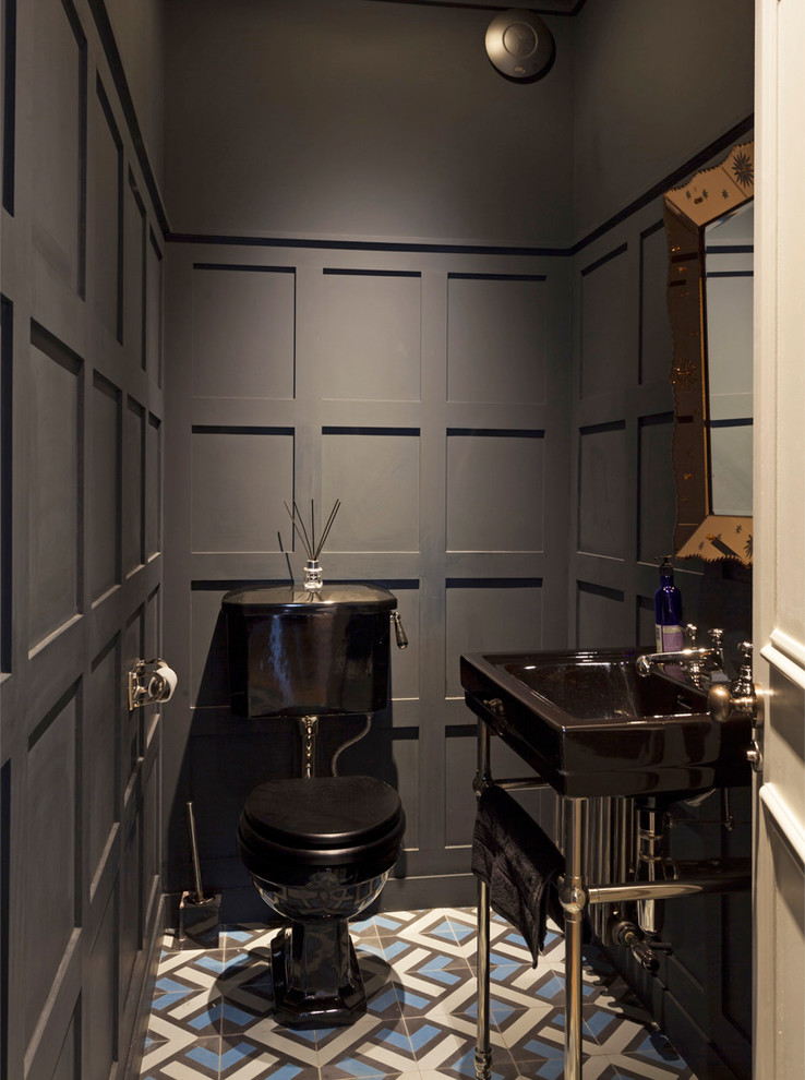 Transitional powder room in London.