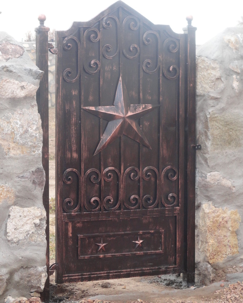 This is an example of a small arts and crafts entryway in Dallas with a brown front door.