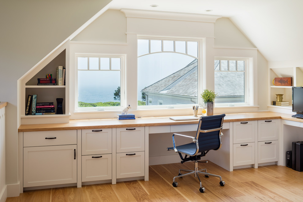 This is an example of a beach style home office in Providence.