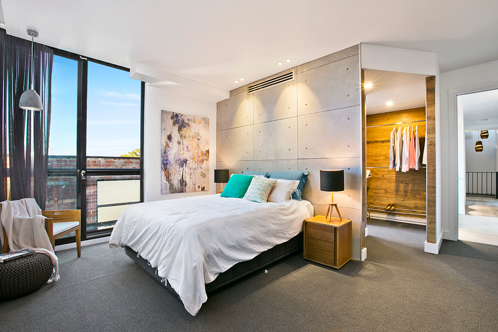 Photo of a modern bedroom in Melbourne.