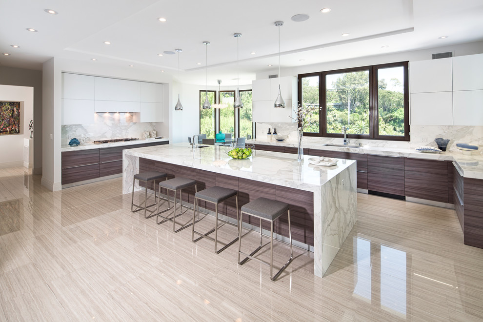 Design ideas for an expansive contemporary u-shaped open plan kitchen in Los Angeles with flat-panel cabinets, dark wood cabinets, white splashback, stone slab splashback, with island, a single-bowl sink, marble benchtops and porcelain floors.