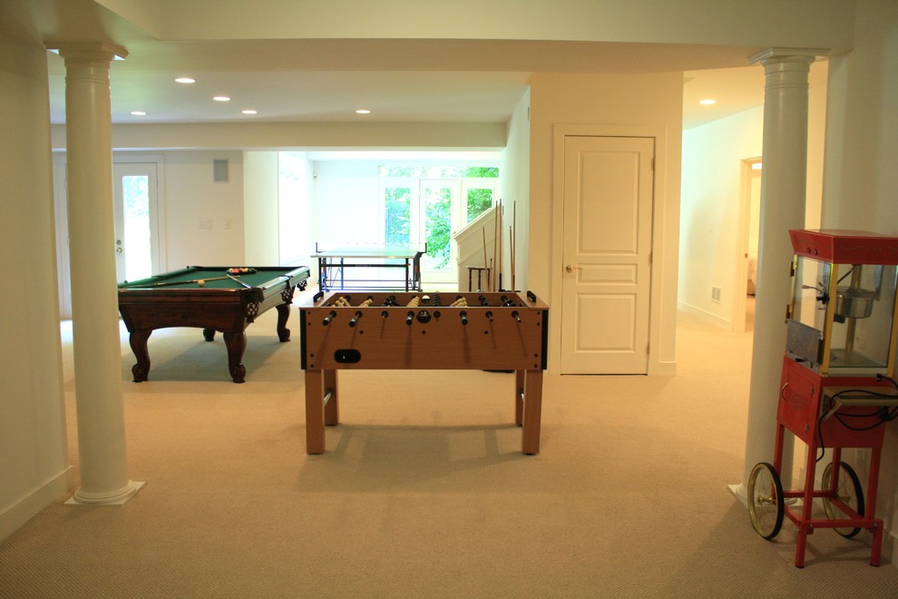 Large traditional walk-out basement in DC Metro with white walls, carpet and no fireplace.