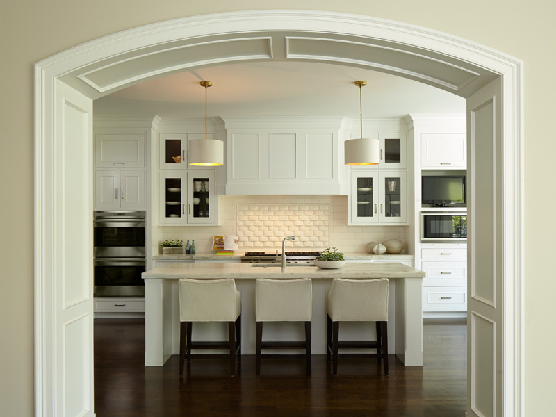 Design ideas for a large transitional galley eat-in kitchen in Chicago with with island.