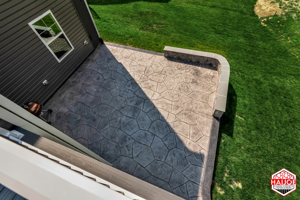 Example of a large transitional backyard second story deck design in DC Metro