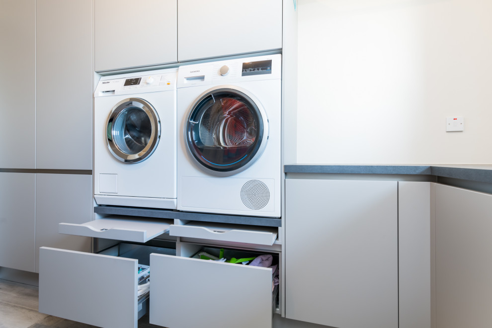 Photo of a contemporary laundry room in Other.