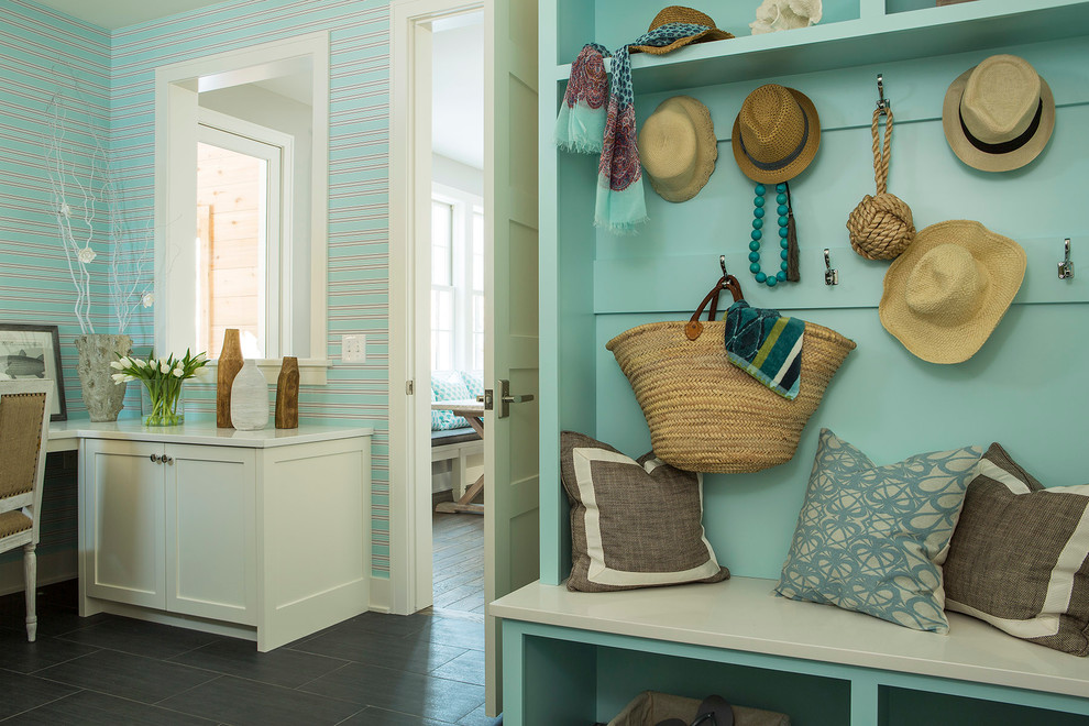This is an example of a beach style entryway in Minneapolis with white walls.