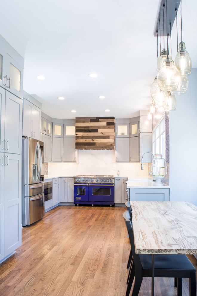 Huge transitional u-shaped eat-in kitchen photo in Denver with shaker cabinets, gray cabinets, quartz countertops, blue backsplash, no island and white countertops