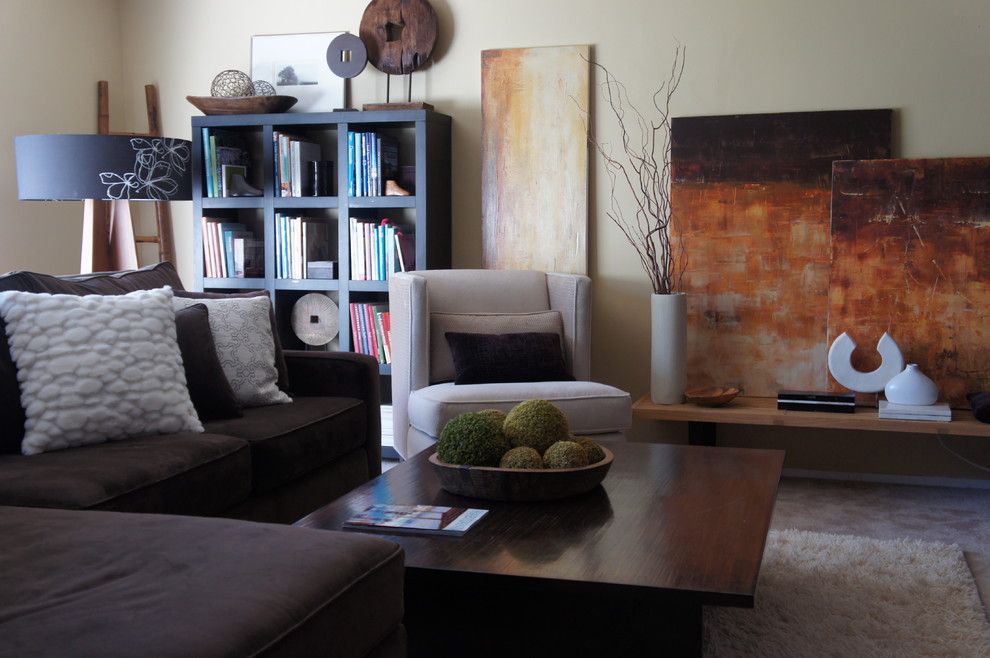 This is an example of an eclectic living room in Seattle with beige walls.