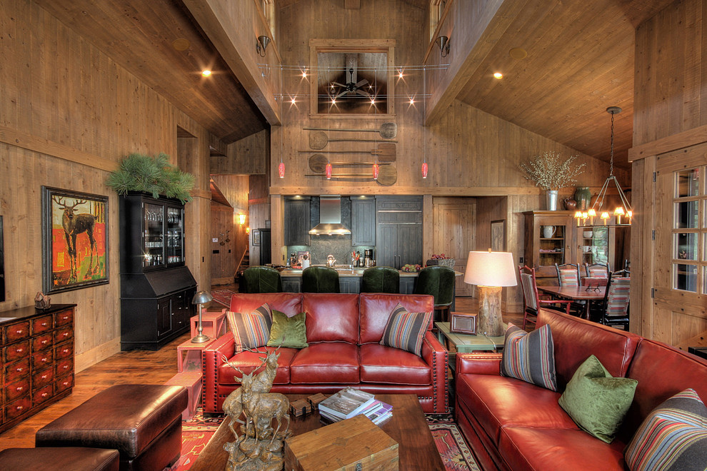 Photo of a country open concept living room in Phoenix with brown walls.
