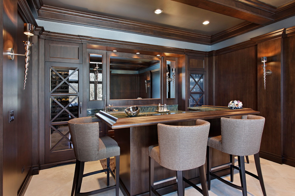 Transitional galley seated home bar in Chicago with recessed-panel cabinets, dark wood cabinets, granite benchtops and mirror splashback.