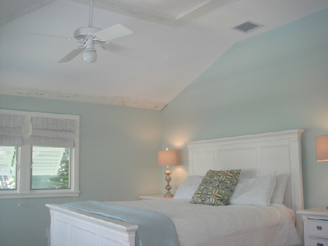 This is an example of a beach style bedroom in Miami.