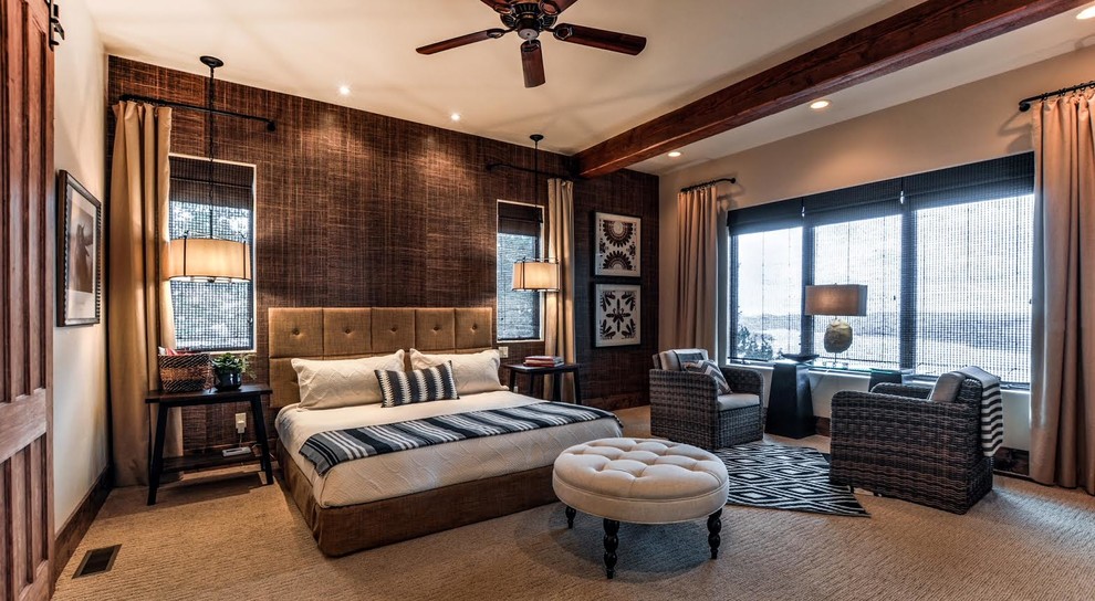 Photo of a large country master bedroom in Other with beige walls, dark hardwood floors, no fireplace and brown floor.