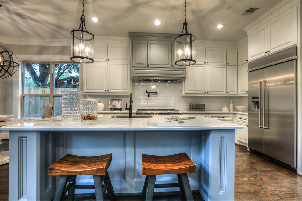 Example of a transitional kitchen design in Houston