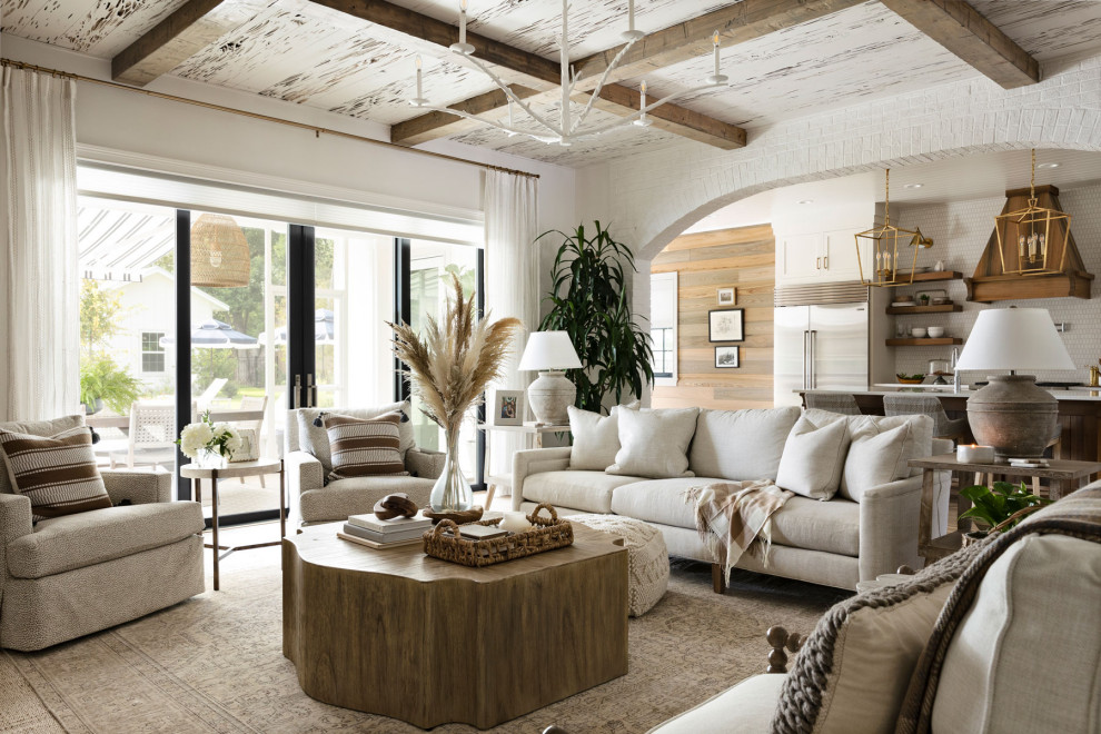 Inspiration for a large coastal formal and open concept medium tone wood floor, brown floor and wood ceiling living room remodel in Orlando with white walls, a stacked stone fireplace and a standard fireplace