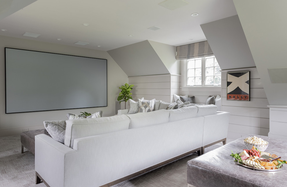 Inspiration for a transitional home theatre in Boston with grey walls, carpet, a projector screen and grey floor.